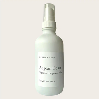 Fragrance mist bottle labeled 'Aegean Coast' by Lantern & Veil on a light gray background