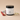 Beija Flor satin signature handmade body lotion lotion jar with dragon fruit and flower on a beige background