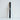 Black fiber diffuser reeds tied with white string on an off white background
