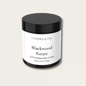 Blackwood Estate satin signature handmade body lotion jar on a light beige background