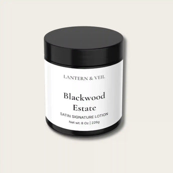 Blackwood Estate satin signature handmade body lotion jar on a light beige background