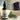 Bottle of Lantern & Veil Beard Conditioning Oil with a dropper on a surface with greenery.