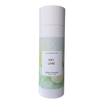Key lime body powder canister with green design on a white background