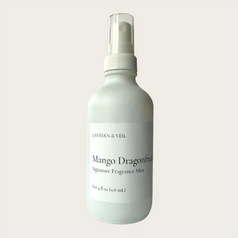 Lantern & Veil Mango Dragonfruit fragrance mist bottle on a light gray background
