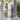 Body powder canister labeled 'Melon Mist' on a blurred background