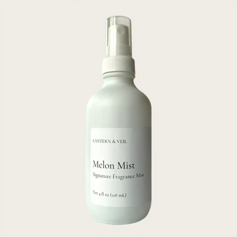 Melon Mist fragrance mist bottle on a light gray background