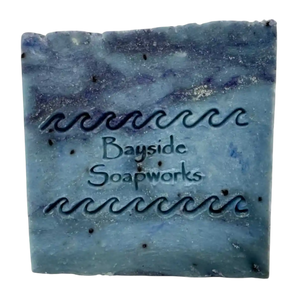 Blue Midnight Cypress soap bar on a white background