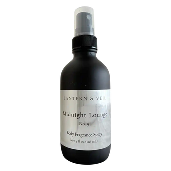 Black body fragrance spray bottle labeled 'Midnight Lounge' by Lantern & Veil on a white background