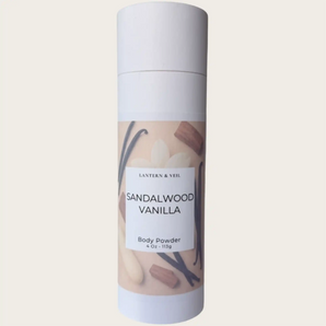 Body powder container labeled 'Sandalwood Vanilla' on a beige background
