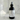 Body fragrance spray bottle labeled 'Solar Drift No. 6' on a marble surface