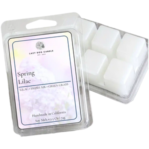 Spring Lilac soy wax melt in a clear clamshell container on a transparent background