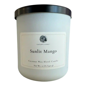 Coconut wax blend candle labeled 'Sunlit Mango' with a black lid on a white background