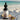 Bottle of Lantern & Veil Beard Conditioning Oil on a beach setting