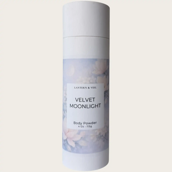 Body powder canister labeled 'Velvet Moonlight' by Lantern & Veil on a light background
