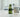 Glass bottle of hemp seed oil on a neutral background with a bar of soap behind the bottle.