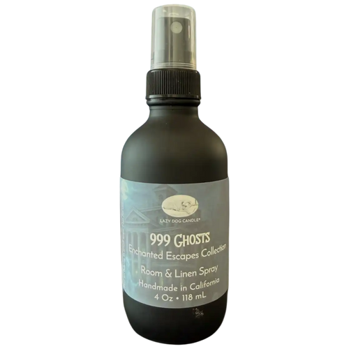 Room spray bottle labeled '999 Ghosts' from Enchanted Escapes Collection on a white background