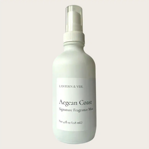 Fragrance mist bottle labeled 'Aegean Coast' by Lantern & Veil on a light gray background