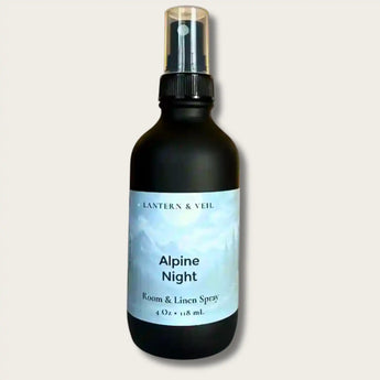 Room spray bottle labeled 'Alpine Night' by Lantern & Veil on a light gray background