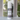 Body powder container labeled 'Blackwood Estate' on a windowsill with a blurred outdoor background.