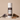 Body powder canister labeled 'Blackwood Estate' with lavender and wood pieces on a beige background