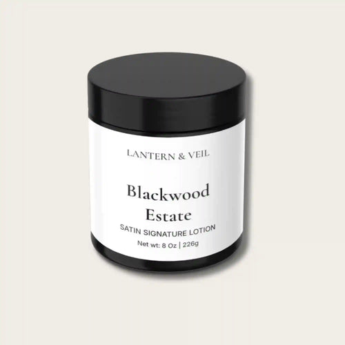 Blackwood Estate satin signature handmade body lotion jar on a light beige background