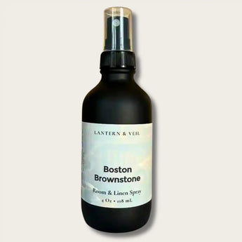 Room spray bottle labeled 'Boston Brownstone' by Lantern & Veil on a light gray background
