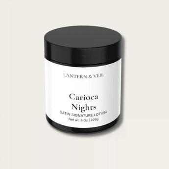 Carioca Nights satin signature handmade body lotion jar on a light beige background