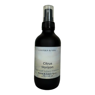 Black spray bottle labeled 'Citrus Horizon' by Lantern & Veil on a white background