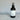 Black spray bottle labeled 'Clean Slate' by Lantern & Veil on a marble surface with a gradient pale blue background.