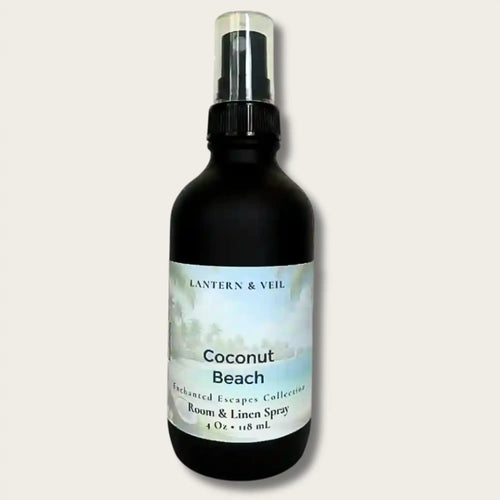 Black bottle of 'Coconut Beach' room & linen spray by Lantern & Veil on a light gray background