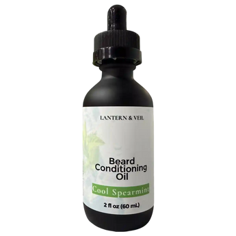 Black bottle of Lantern & Veil Beard Conditioning Oil with dropper on a white background