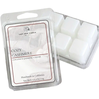 Cozy Cashmere soy wax melt clamshell with white wax cubes on a transparent background