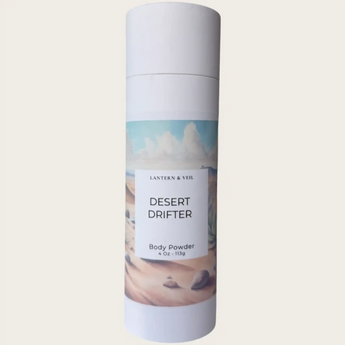 Body powder canister labeled 'Desert Drifter' by Lantern & Veil on a light gray background