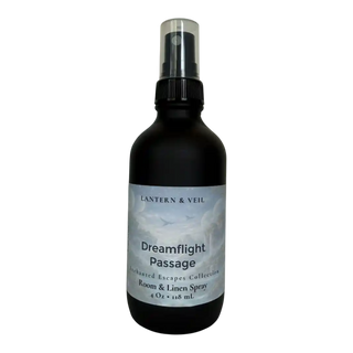Black spray bottle labeled 'Dreamflight Passage' by Lantern & Veil on a white background
