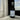 Bottle of 'Dreamflight Passage' spray on a surface with a window in the background