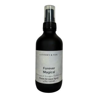Black spray bottle labeled 'Forever Magical' by Lantern & Veil on a white background