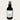 Black spray bottle labeled 'Forever Magical' by Lantern & Veil on a light gray background