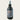 A matte black bottle of Lantern & Veil 'Hallowed Ground'  room and linen spray, shown against a solid off-white background.