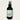 Black room and linen spray bottle labeled 'Jungle Navigation Co' on a light gray background