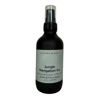 Black room and linen spray bottle with a label on a white background