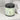 Jar of 'Key Lime' cleansing sugar scrub with a black lid on a white surface.