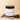 Lavender Woods satin signature handmade lotion jar with lavender, vanilla bean, and wood on a beige background