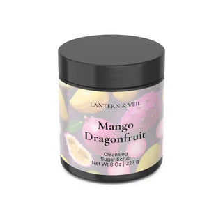 Jar of Mango Dragonfruit cleansing sugar scrub with colorful label on a white background