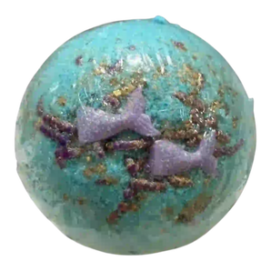 Bath bomb with purple mermaid figures and gold glitter on a white background
