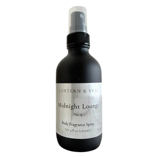 Black body fragrance spray bottle labeled 'Midnight Lounge' by Lantern & Veil on a white background