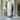 Body powder container labeled 'Mystic Meadow' on a blurred natural background