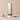 Body powder container labeled 'Mystic Meadow' with decorative elements on a beige background