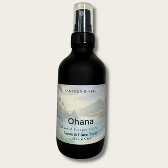 Black spray bottle labeled 'Ohana' by Lantern & Veil on a light gray background