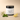 Lantern & Veil Peppermint Shores lotion jar with mint leaves and a lemon wedge on a beige background