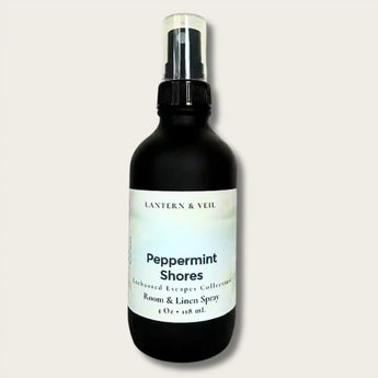 Black spray bottle labeled 'Peppermint Shores' by Lantern & Veil on a light gray background